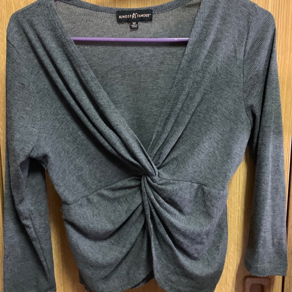 Quarter sleeve V-neck top